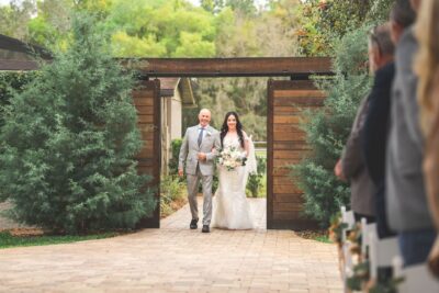 bride walking down the aisle with her dad for the wedding ceremony, Orlando, FL
