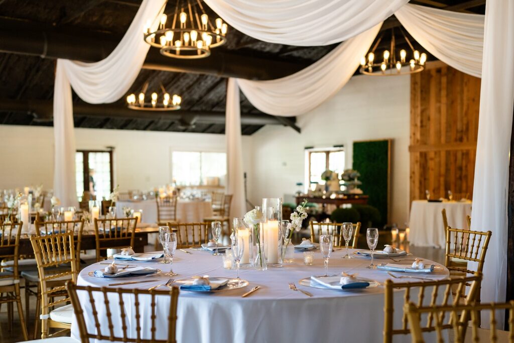 venue indoor ceremony set up, white tablecloths, round tables, Orlando, FL