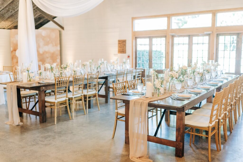 long tables, wooden chairs, glassware, reception, Moss Estates, Orlando, FL