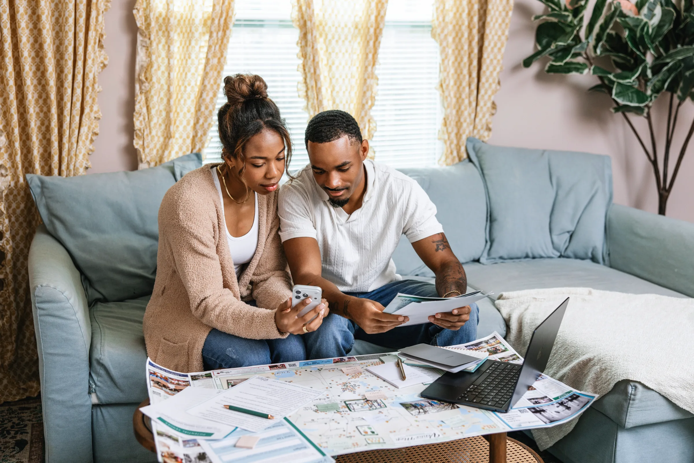 wedding venue map bumbyphotography 0490 - Wedding Venue Shopping Tips Every Newly Engaged Couple Should Know engaged couple sitting on couch reviewing wedding venue options using Wedding Venue Map, part of wedding venue shopping tips and planning process
