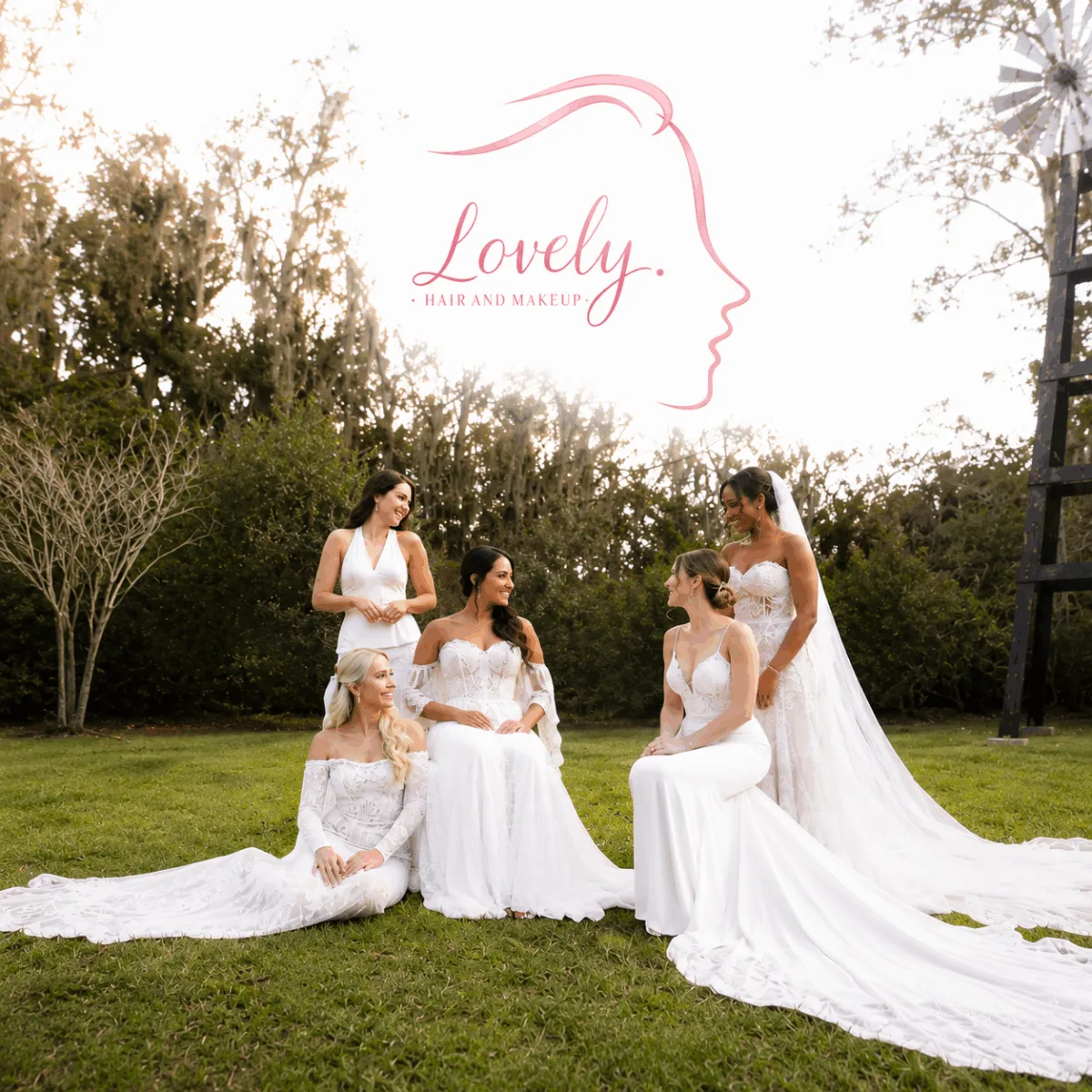 Five brides in modern wedding gowns posing in a dreamy outdoor setting with Lovely Hair and Makeup branding.
