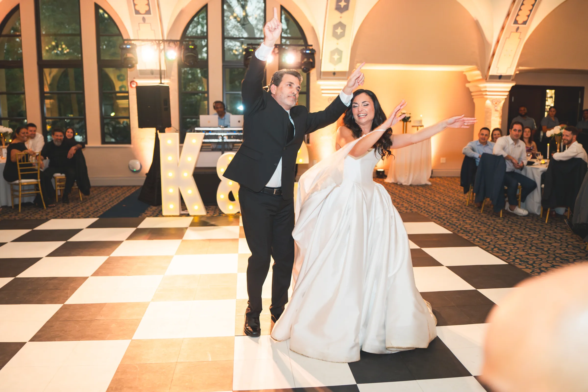 CodyKarinaWedding03 15 2026 1170 - European Inspired Wedding | Rollins College Bride and her father performing a choreographed father daughter dance on checkered dance floor at european inspired wedding reception