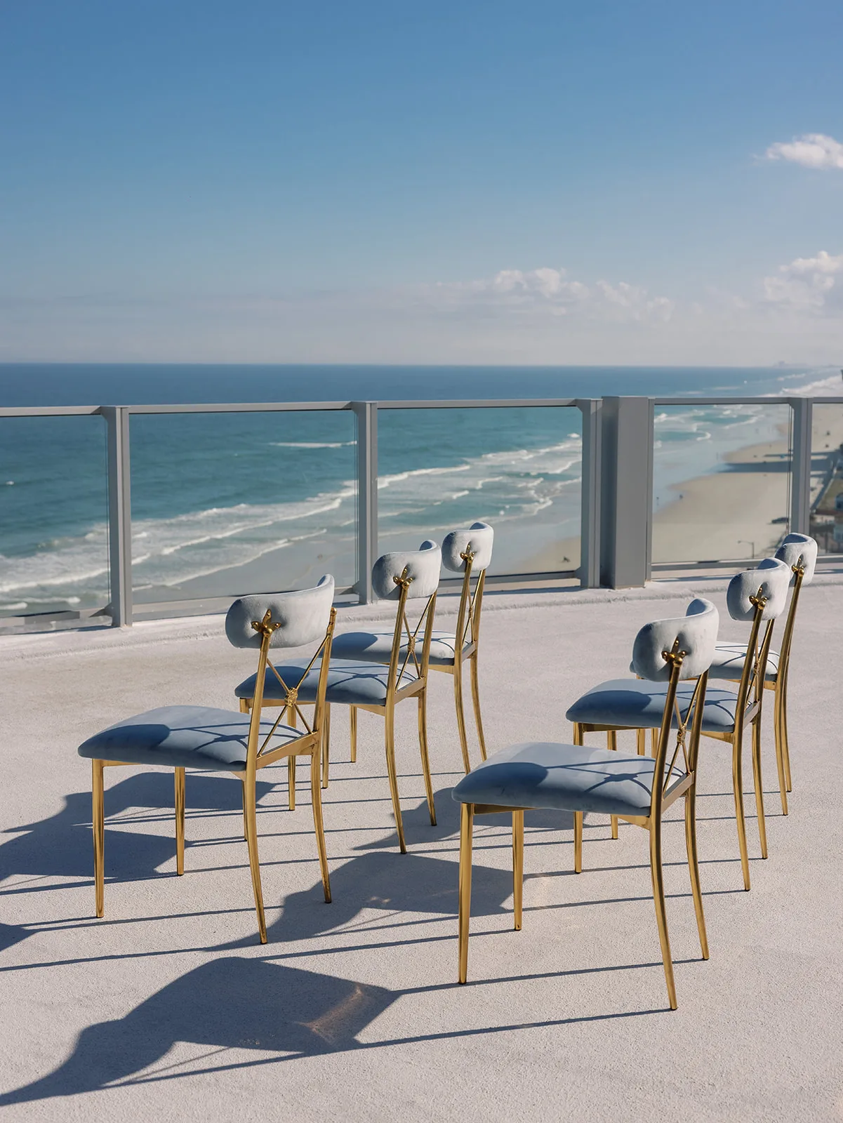 BB Cer 001 - Romantic Blush and Blue Daytona Beach Wedding Dusty blue chairs at daytona beach wedding