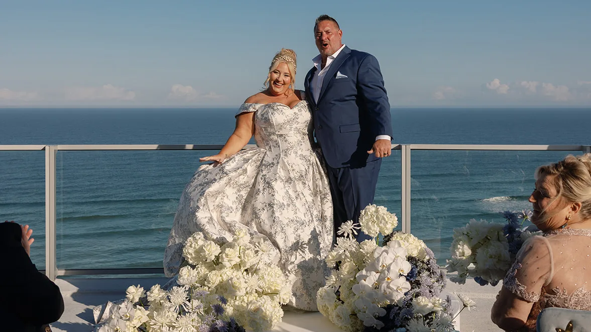 BB Cer 160 1 edited - Romantic Blush and Blue Daytona Beach Wedding Bride and groom just said "I do"