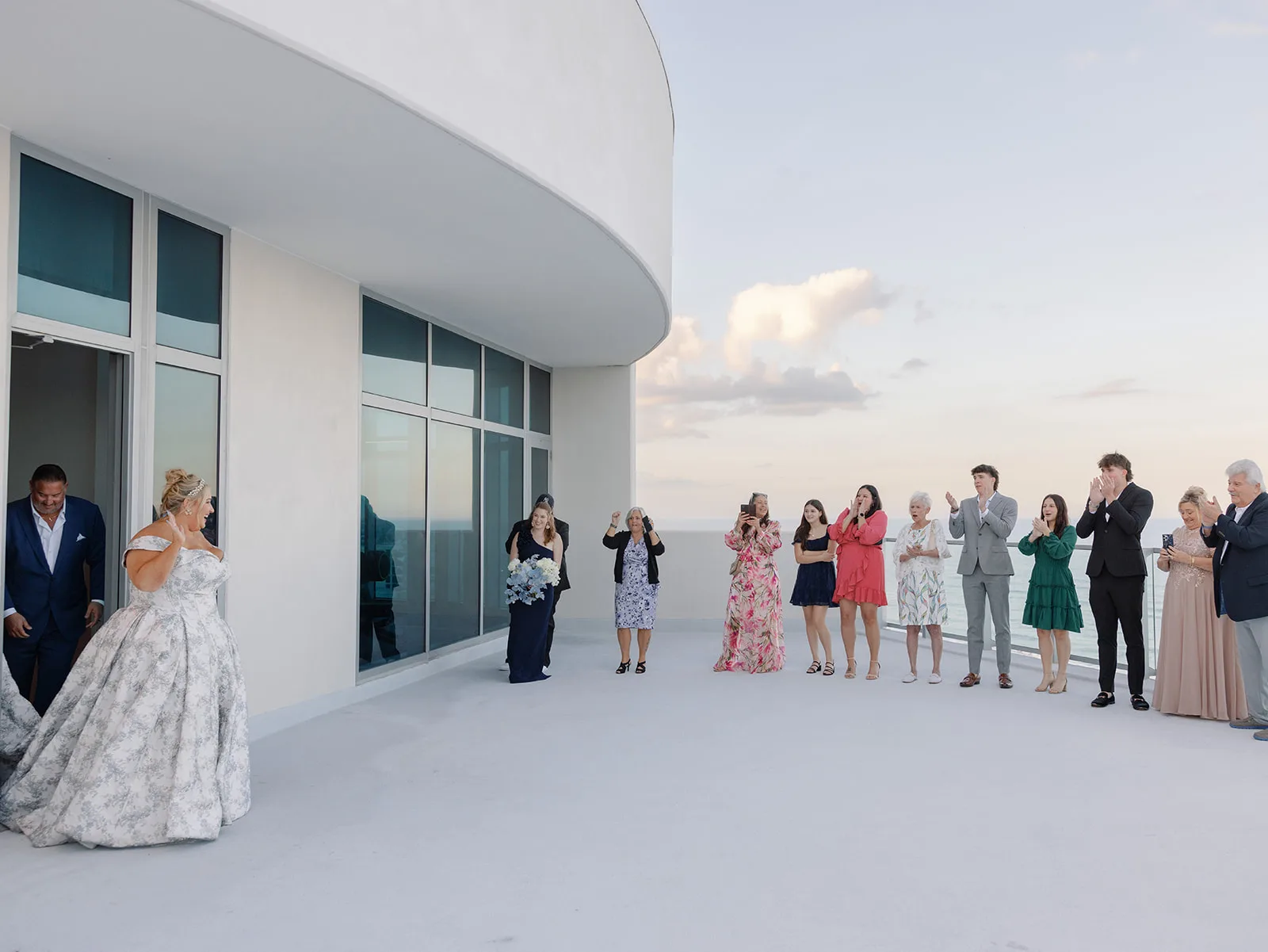 BB FD 006 - Romantic Blush and Blue Daytona Beach Wedding Bride and groom greeting their guests