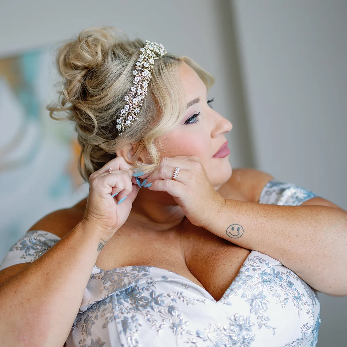 BB GR 035 1 edited - Romantic Blush and Blue Daytona Beach Wedding Bride putting on her wedding jewelry