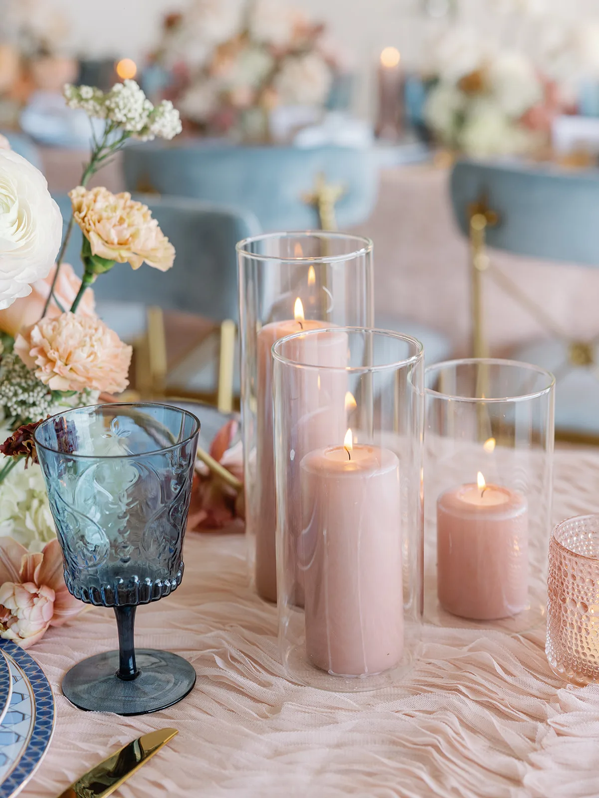 BB Rec Details 114 - Romantic Blush and Blue Daytona Beach Wedding Blush tablescape with blue water goblets and candles