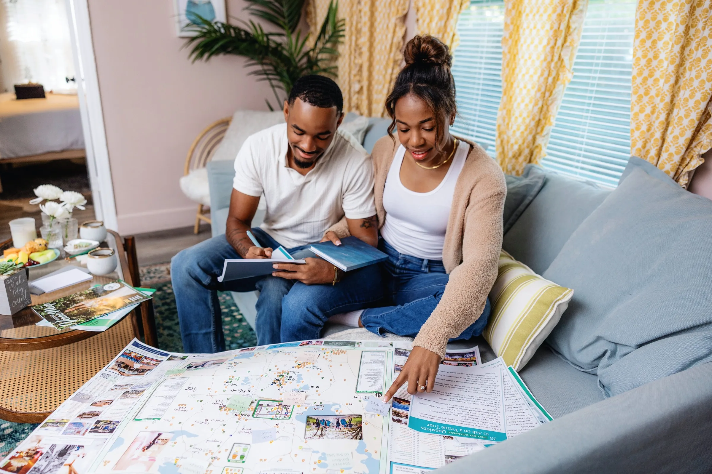 Couple Reviews Printed Wedding Venue Map - Start Here Couple finding their Florida wedding venue using the printed Wedding Venue Map