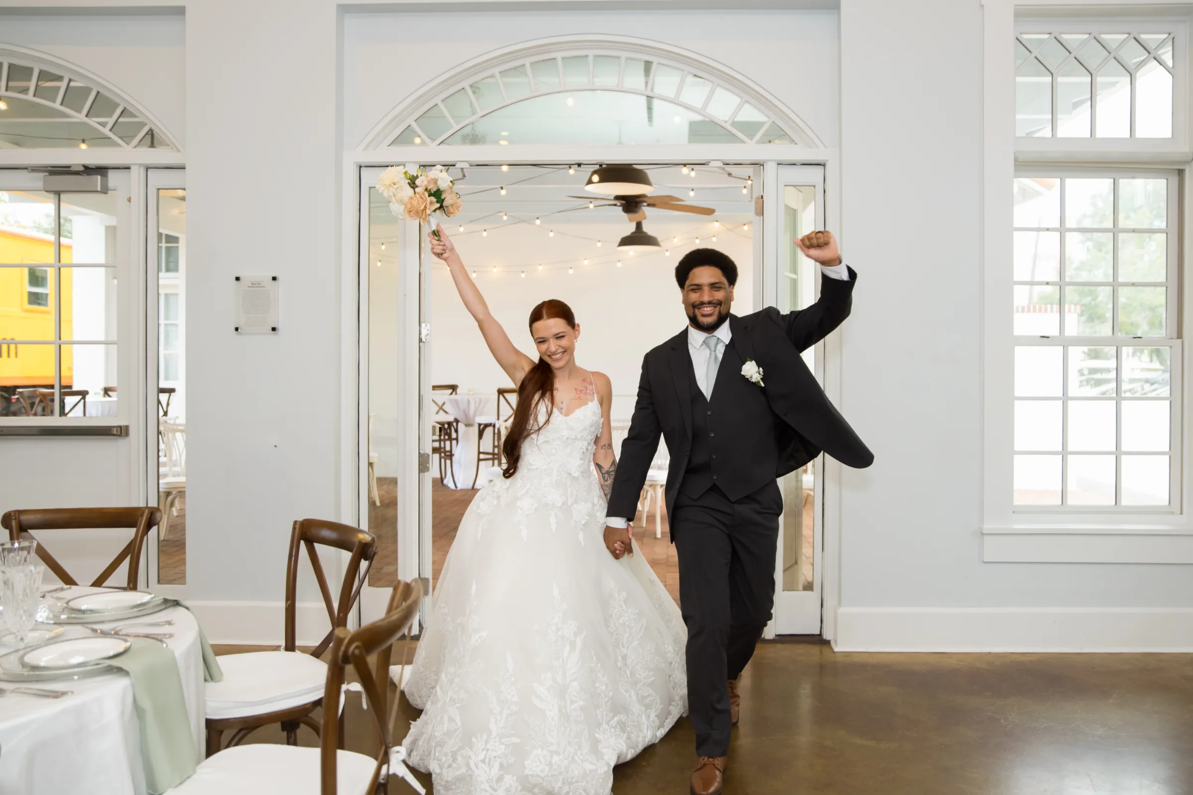 classic romantic wedding inspiration20 - Classic Romantic Wedding Inspiration at Heller Hall in Winter Garden Bride and groom walking into their classic romantic wedding