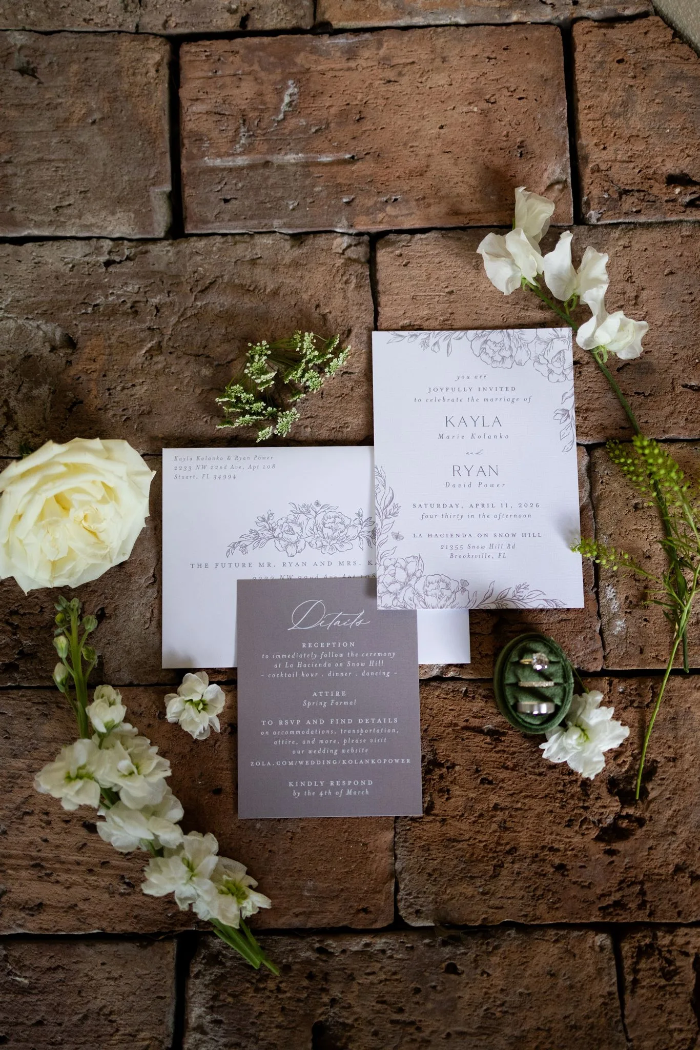 lilac ivory wedding invitation suite la hacienda snow hill - An Elegant Lilac and Ivory Wedding at La Hacienda on Snow Hill Elegant lilac and ivory wedding invitation suite with floral illustrations displayed on rustic brick for Kayla and Ryan's spring wedding at La Hacienda on Snow Hill in Brooksville Florida